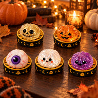 Les 5 squishys Halloween pailletés dans leurs boîtiers